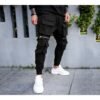 Jones Wears Black Cargo Jogger With Zippers